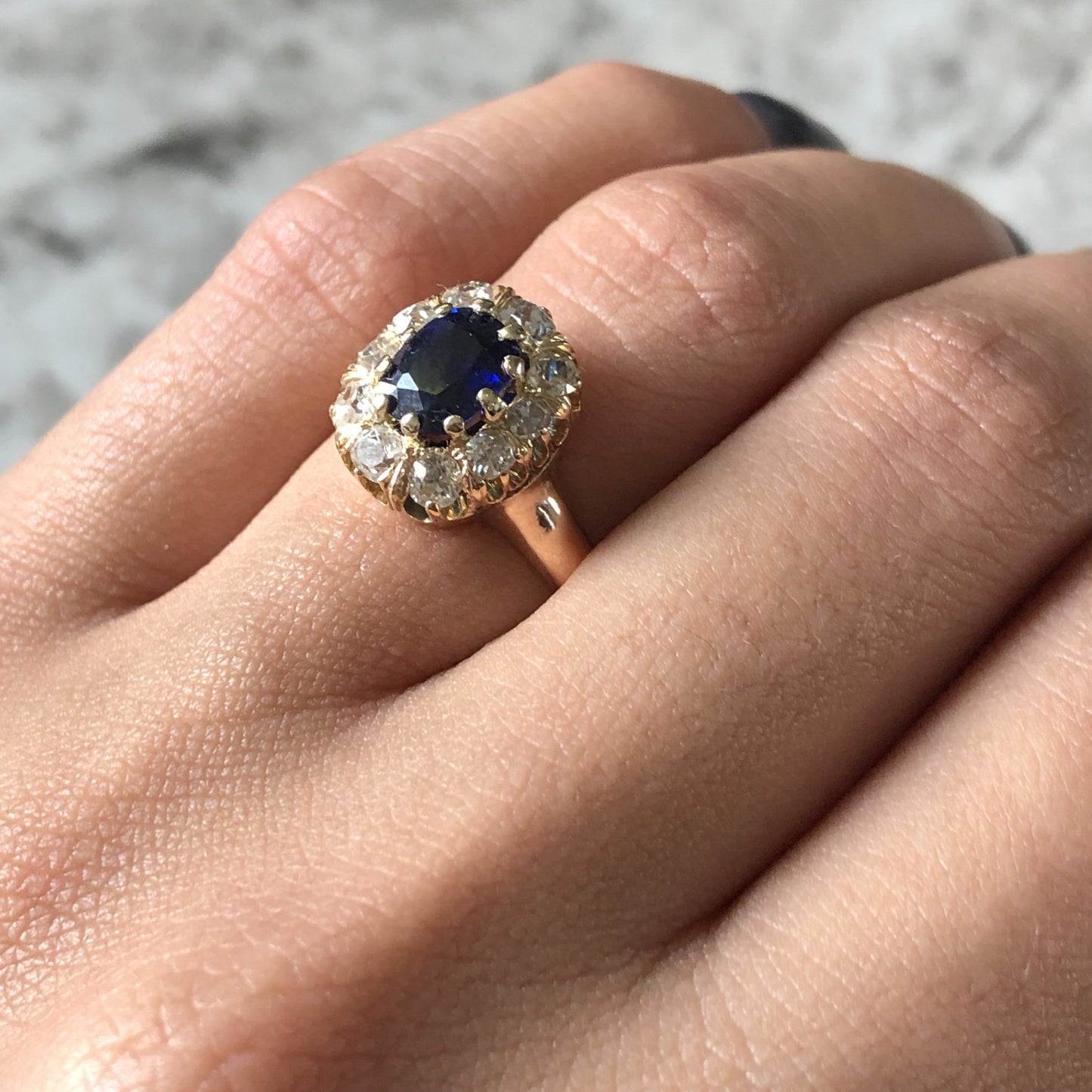 18k Yellow Gold 1ct Oval Cut Sapphire and 0.70ctw Diamond Halo Ring