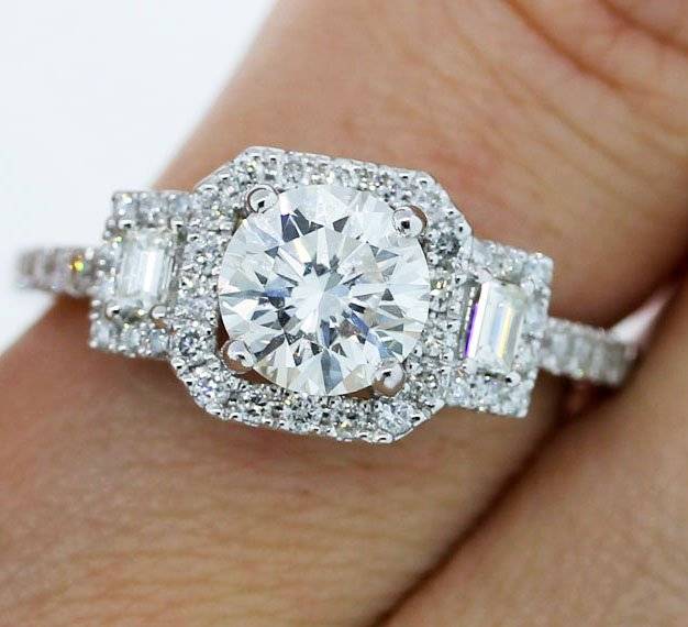 3 stone halo engagement ring that's totally unique