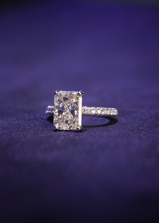 Square halo radiant cut engagement ring