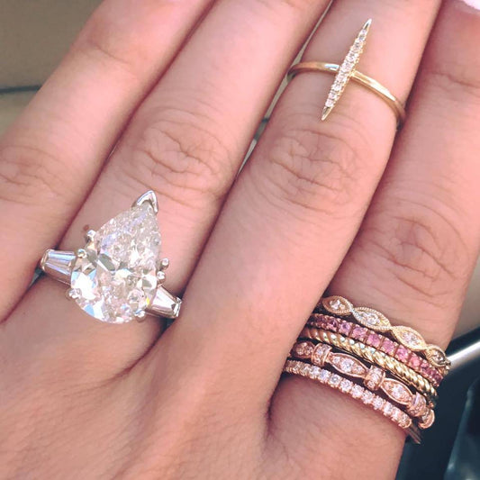 How does shape affect engagement ring cost