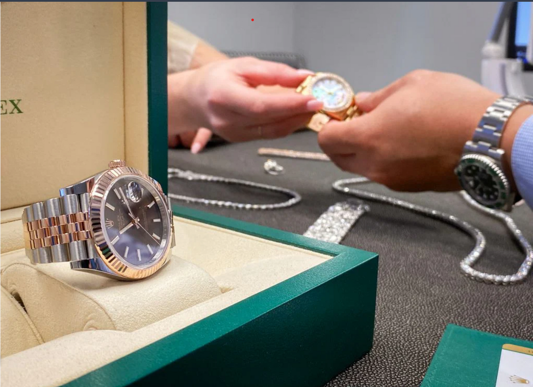 Luxury watch evaluation at Raymond Lee Jewelers with Rolex timepieces during a professional appraisal in Boca Raton.