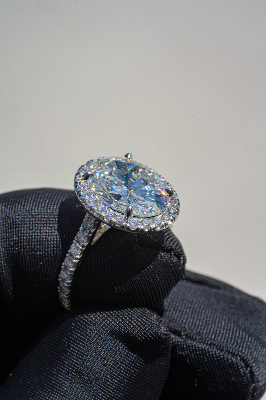 Carat D-VSS1 oval cut diamond pave set – the perfect engagement ring.