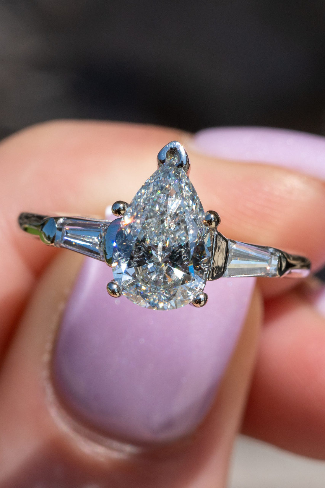 Pear-shaped diamond engagement rings carry the image of a teardrop