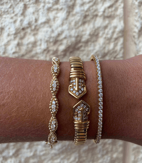 two gold jewelry rings