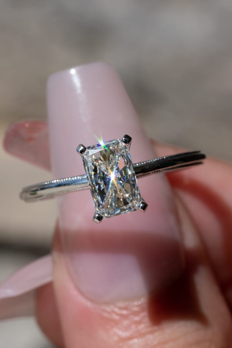 princess solitaire ring
