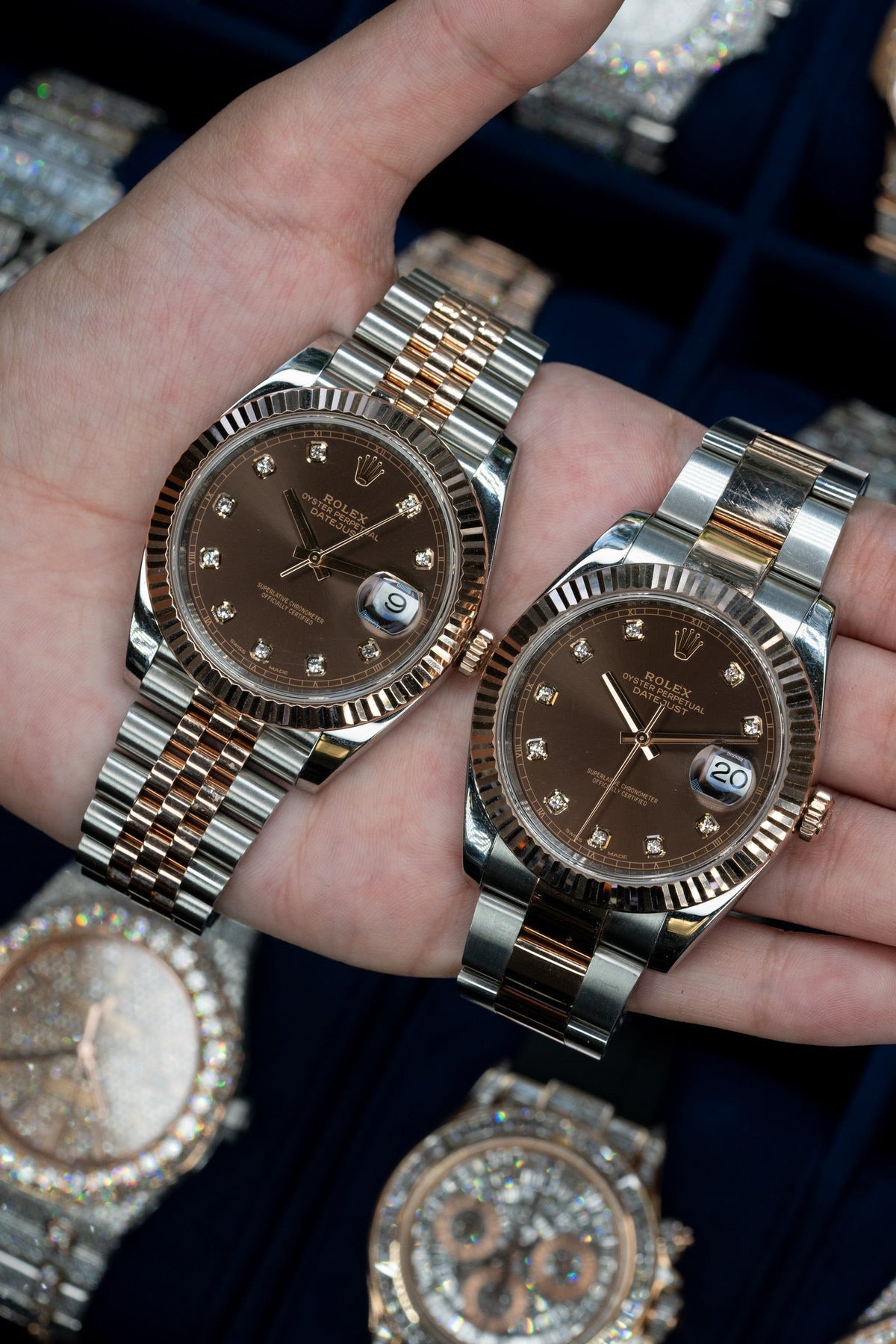 Two Rolex Datejust watches with brown dials and two-tone bracelets