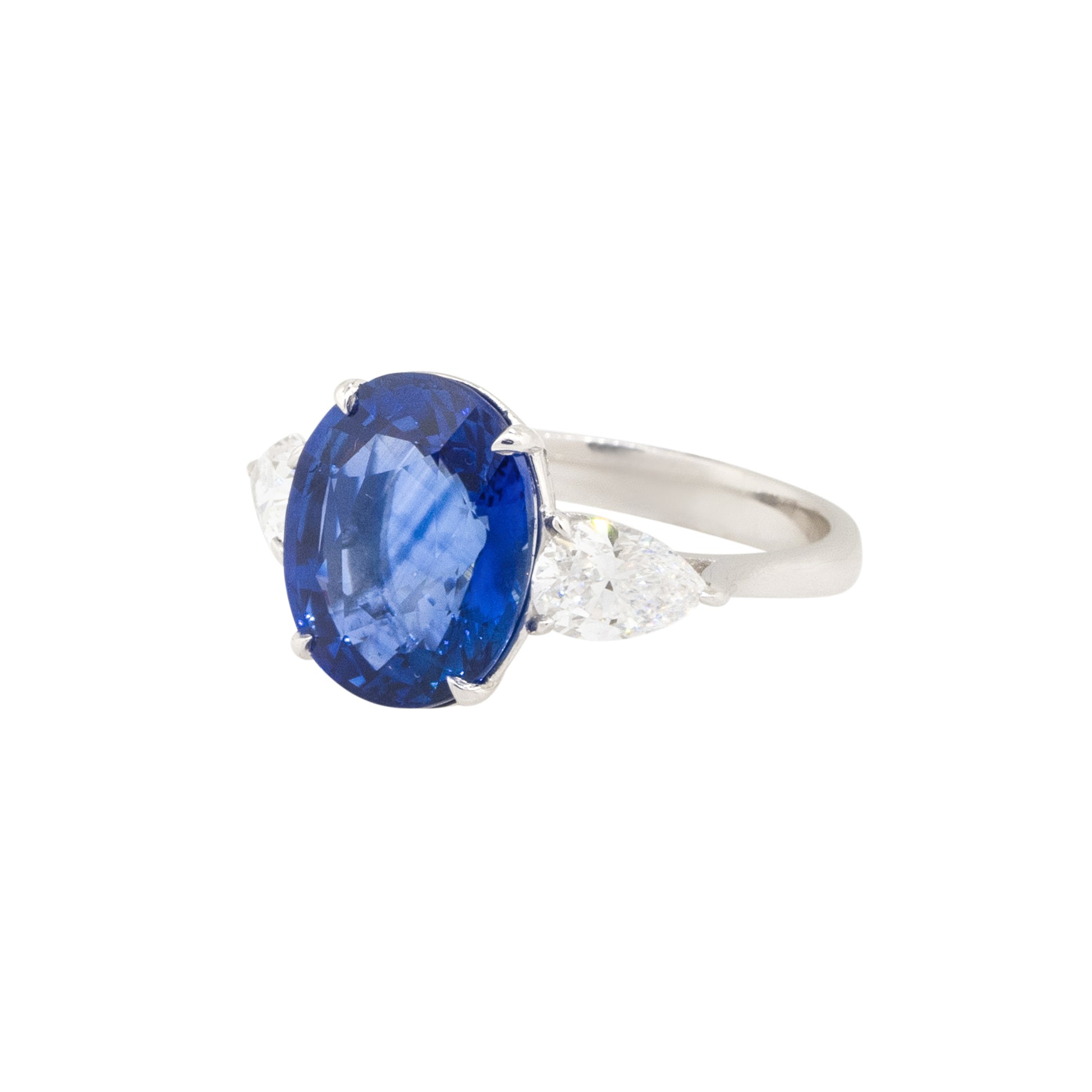 18k White Gold Oval Cut Sapphire & Diamond Three Stone Ring