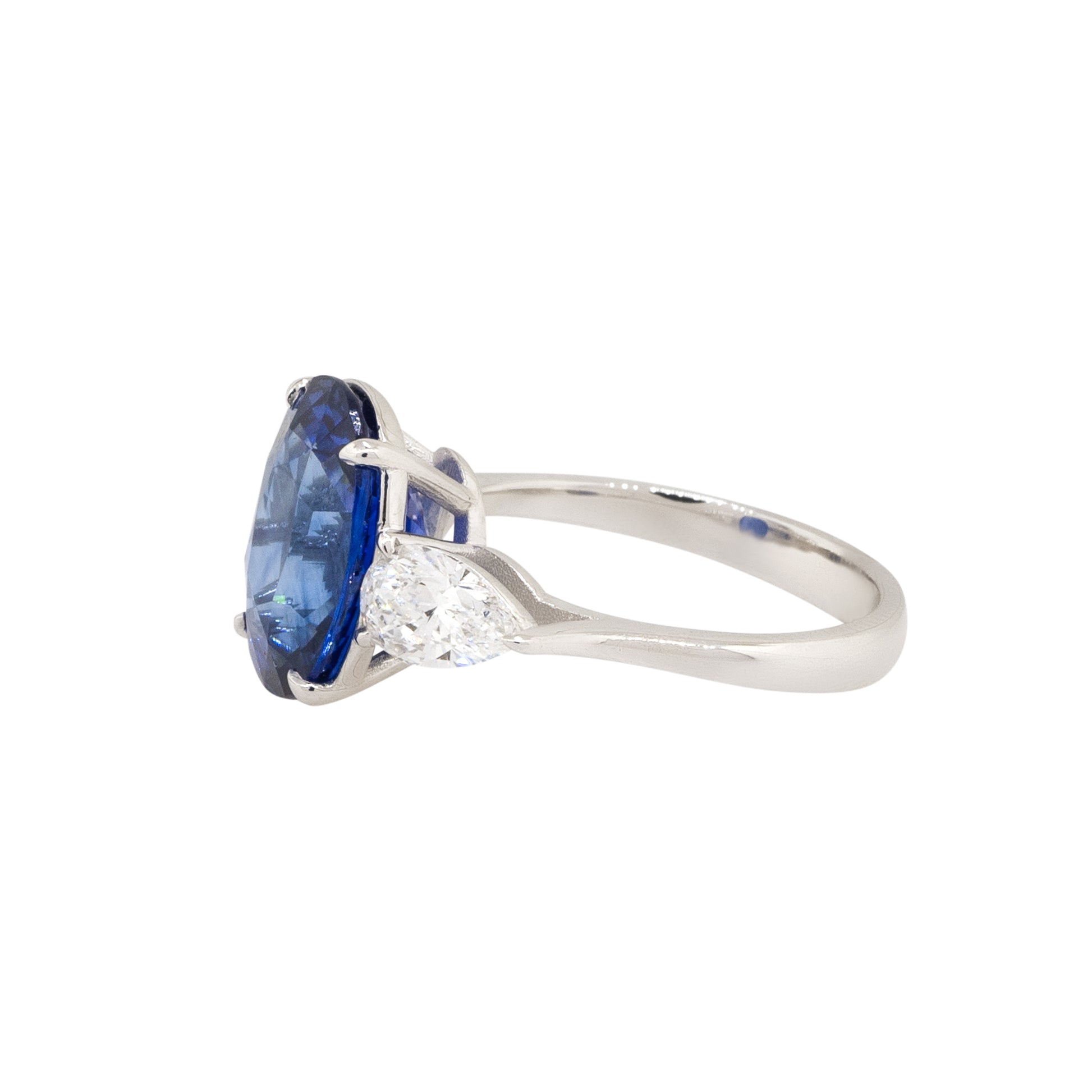 18k White Gold Oval Cut Sapphire & Diamond Three Stone Ring