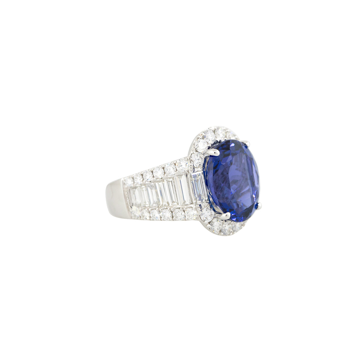 18k White Gold 7.75ct Oval Cut Tanzanite & 3.2ct Diamond Halo Ring