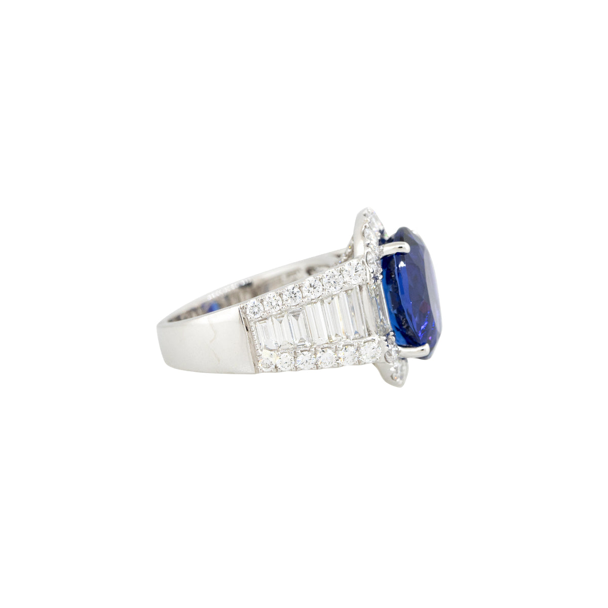18k White Gold 7.75ct Oval Cut Tanzanite & 3.2ct Diamond Halo Ring