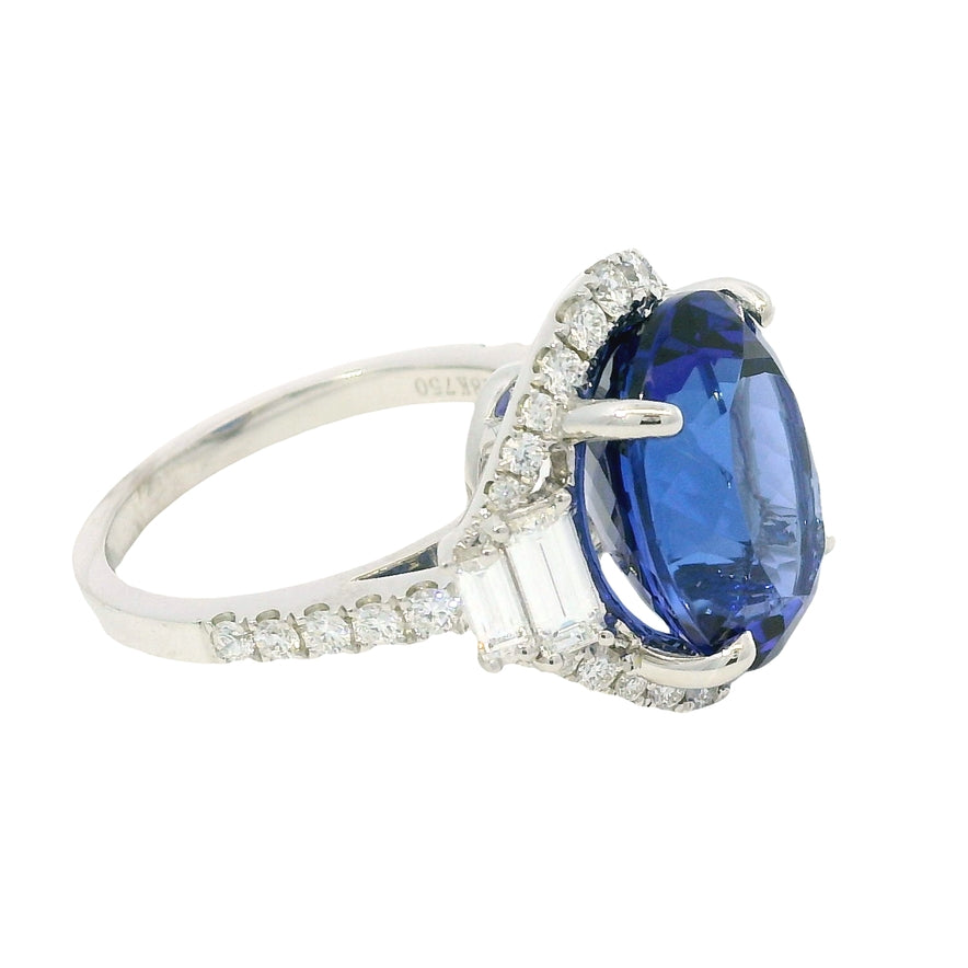 18k White Gold Natural 8.20 Carat Oval Tanzanite and Diamond Halo Ring