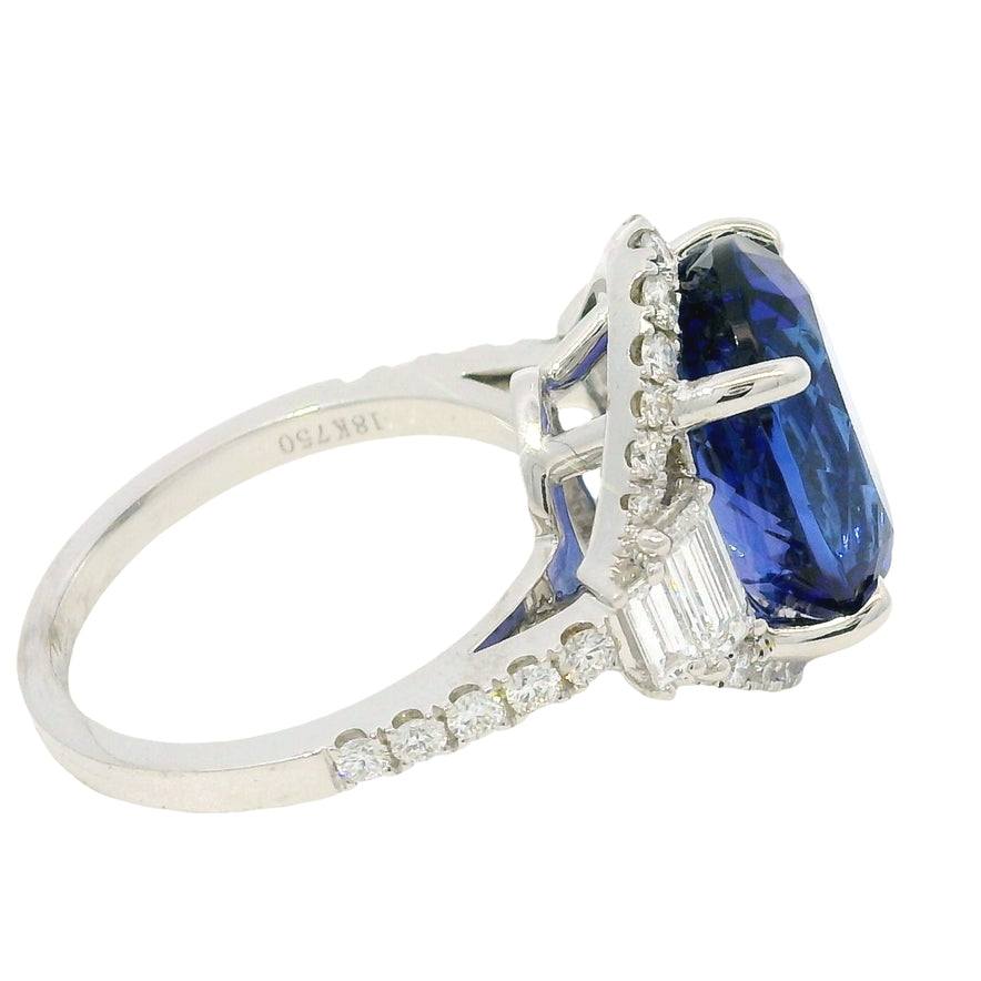 18k White Gold Natural 8.20 Carat Oval Tanzanite and Diamond Halo Ring