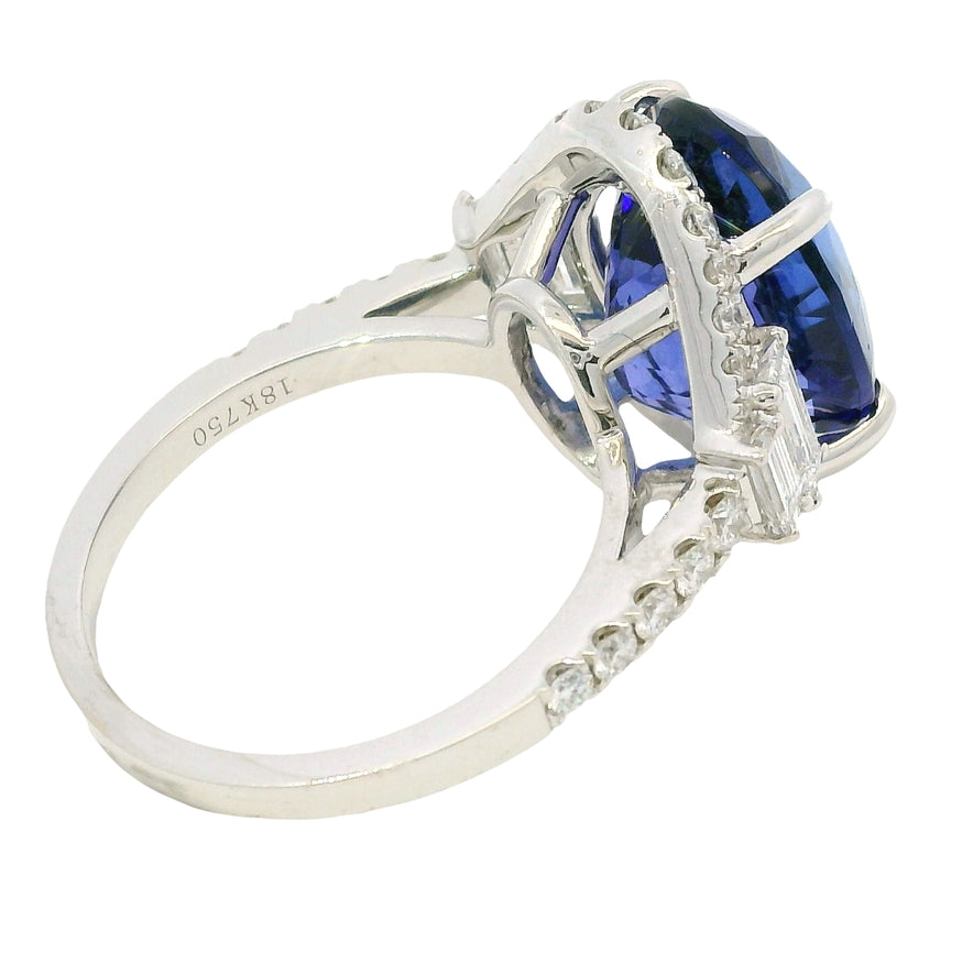 18k White Gold Natural 8.20 Carat Oval Tanzanite and Diamond Halo Ring