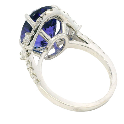 18k White Gold Natural 8.20 Carat Oval Tanzanite and Diamond Halo Ring