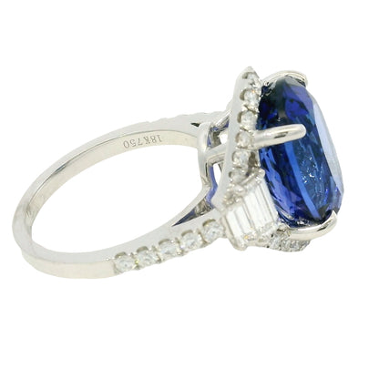 18k White Gold Natural 8.20 Carat Oval Tanzanite and Diamond Halo Ring