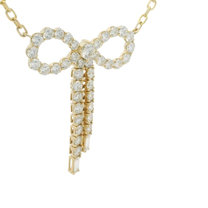 14k Yellow Gold Baguette And Round Diamond Bow Pendant Necklace
