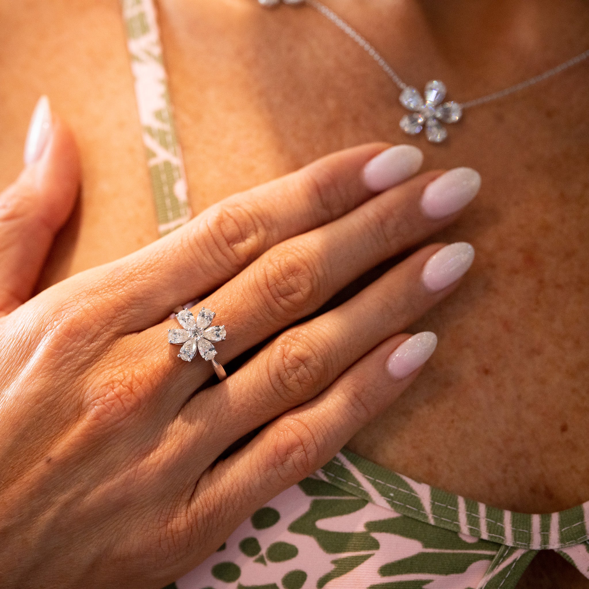 18k White Gold 1.60ctw Pear Shaped Diamond Flower Ring