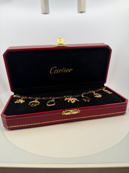Cartier 18k Yellow Gold Charm Bracelet With 7 Charms