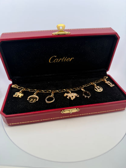 Cartier 18k Yellow Gold Charm Bracelet With 7 Charms