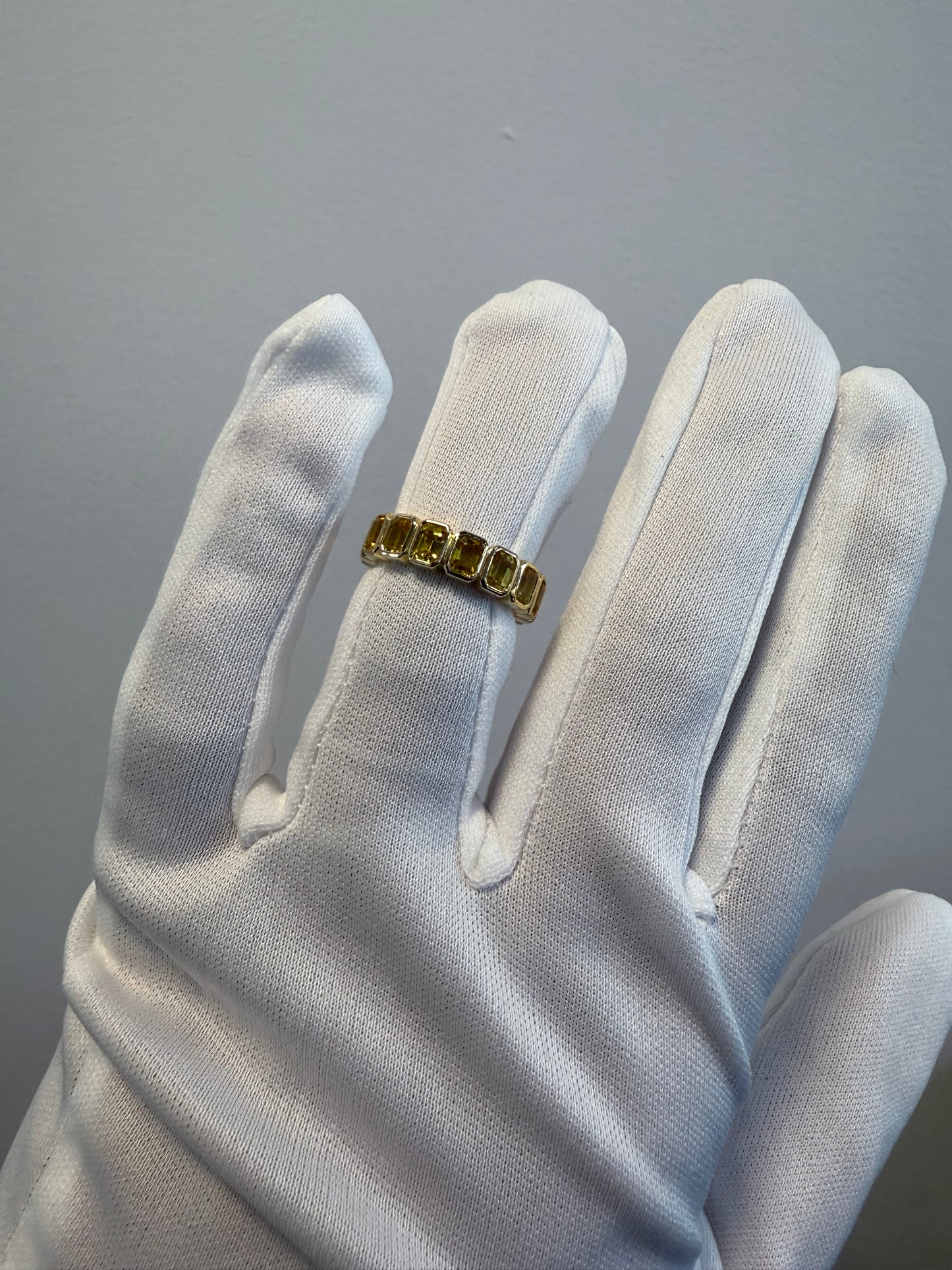 18K Yellow Gold Natural 4.20 Carats Yellow Sapphire Emerald Cut Eternity Ring