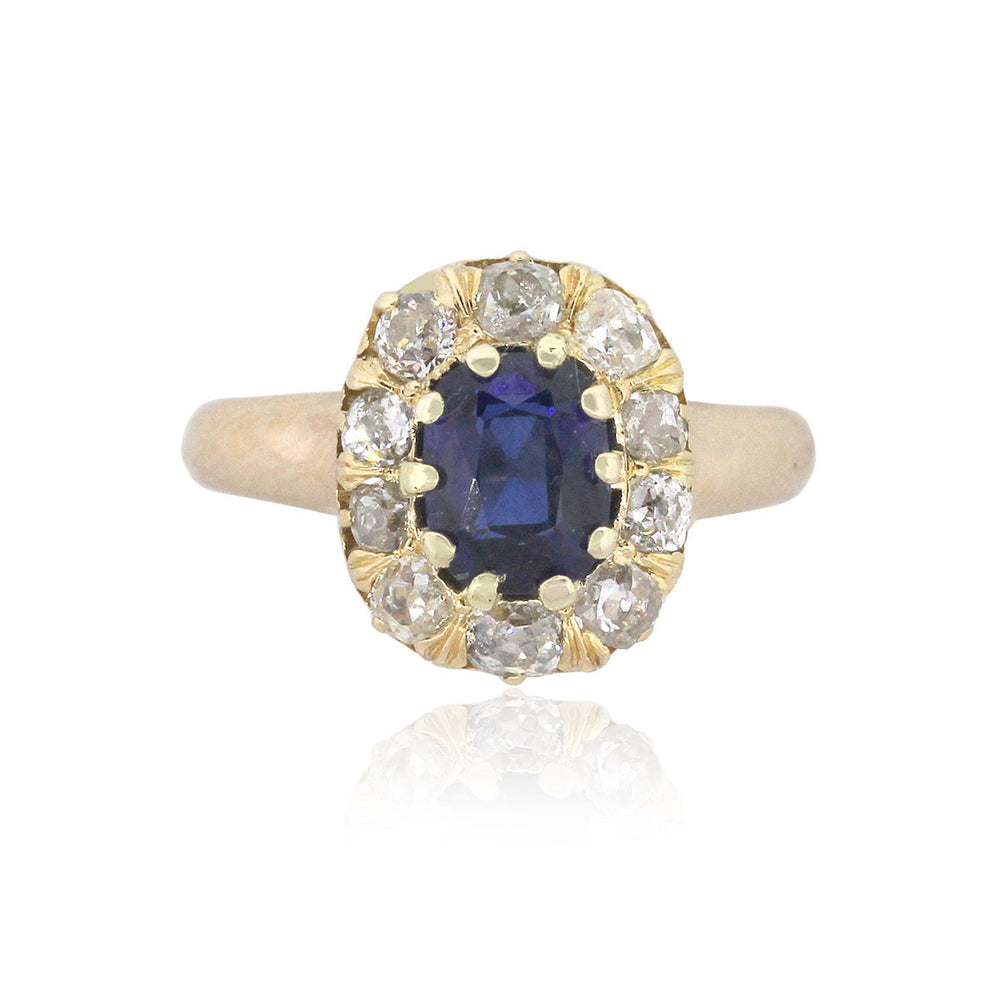 18k Yellow Gold 1ct Oval Cut Sapphire and 0.70ctw Diamond Halo Ring