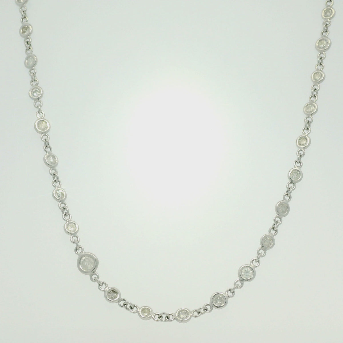 Platinum Natural Round Brilliant Cut Diamonds Station Necklace