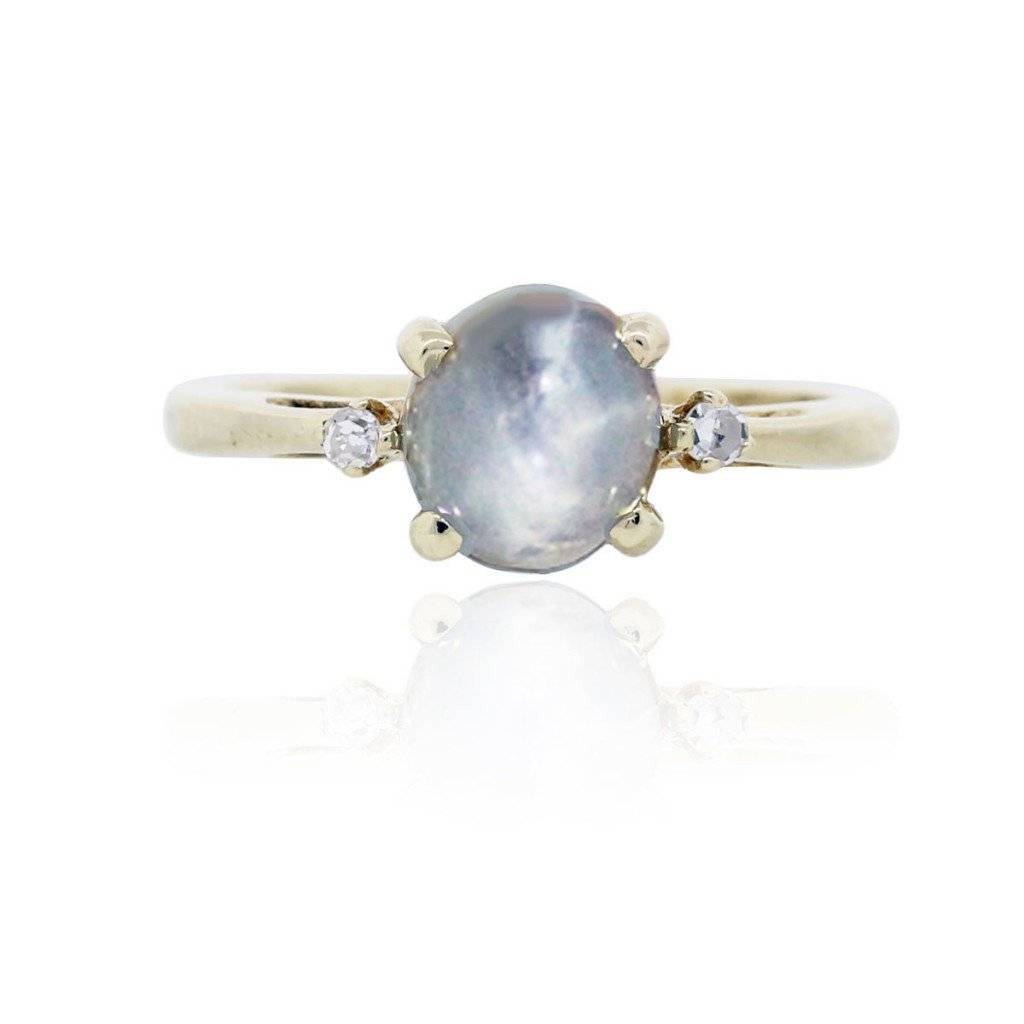 Unique star sapphire engagement ring