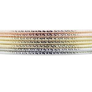 Mixed metal stacked bangles rose gold white gold yellow gold