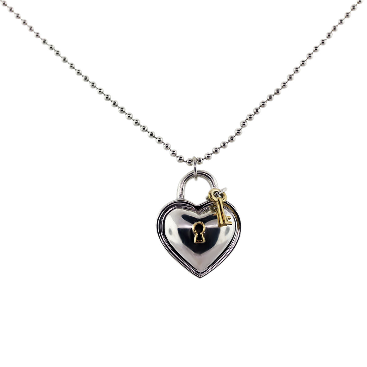 Tiffany & Co. Silver Heart Shaped Lock and Key Pendant ...