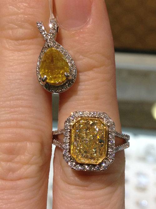 EGl vs GIA diamonds with fancy yellow diamond engagement ring
