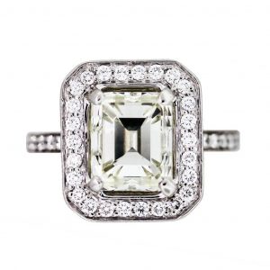 4 Carat Emerald Cut Diamond Platinum Engagement Ring in Halo Setting