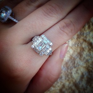 Art Deco style emerald cut engagement ring