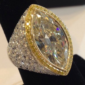 Yellow diamond and white diamond marquise shaped ring