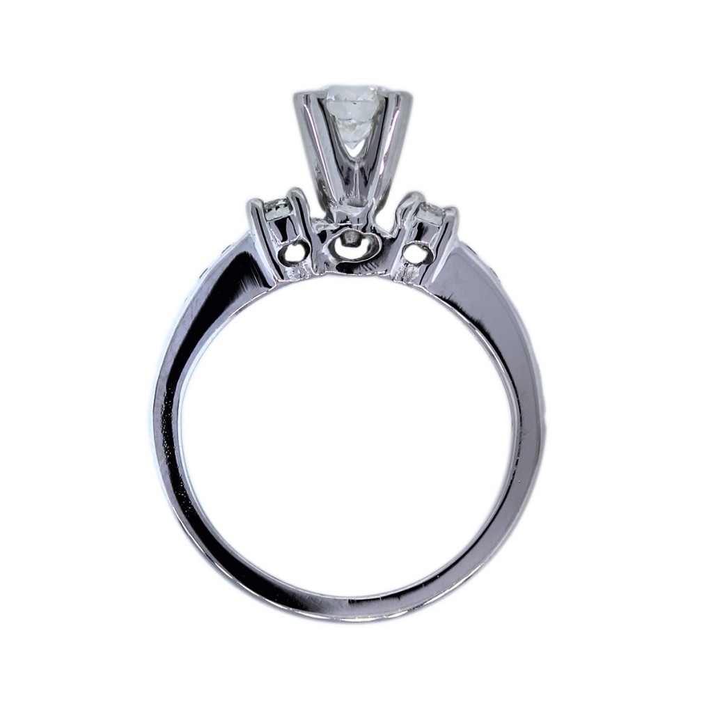 0.54 carat solitaire with accent diamond ring