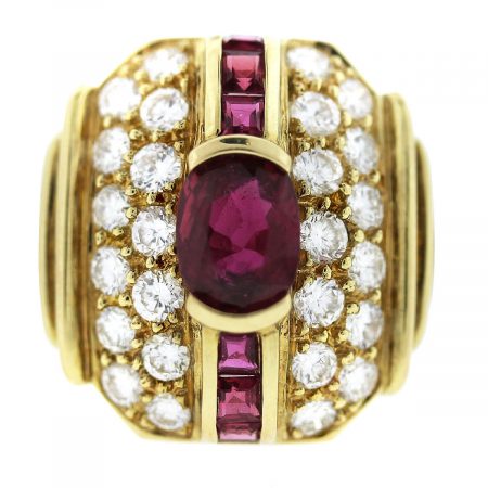 You are viewing this Vintage 18k Yellow Gold Ruby and Diamond Ring!