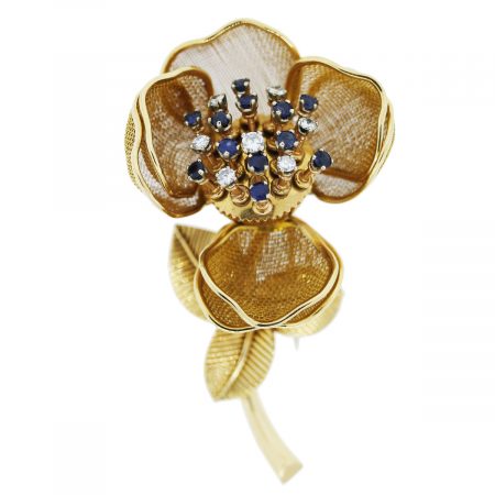 You are viewing this Yellow Gold Diamond and Sapphire Movable Flower Pin!
