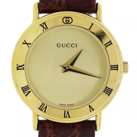 You are viewing this Vintage Gucci Gold Watch!