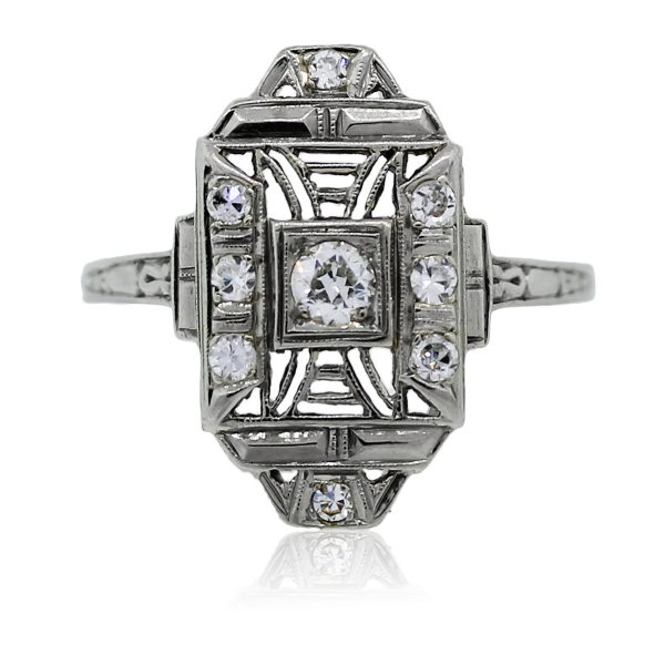 You are viewing this 18k white gold diamond vintage ring!