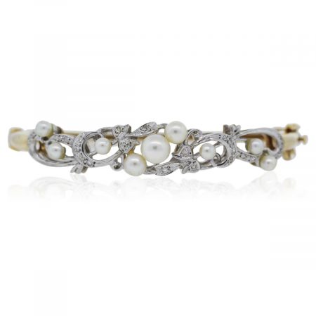 You are viewing this Vintage Yellow Gold Diamond and Pearl Bracelet!!