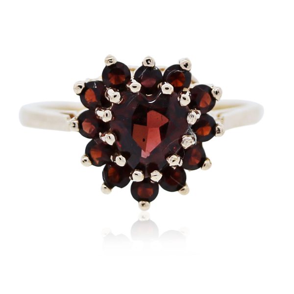 You are viewing this yellow gold and garnet heart shaped ring!!