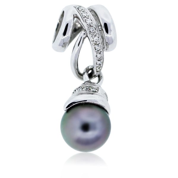 You are viewing this white gold black pearl and diamond pendant!!