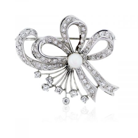 You are viewing this 14k White Gold With Diamonds and Pearl Pin!