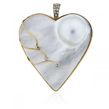 You are viewing this Yellow Gold Mobe Pearl and Diamond Heart Penant!