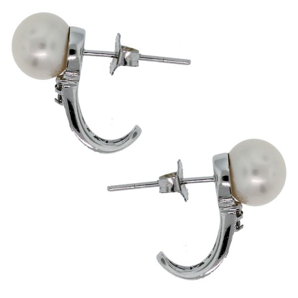 Check out these 14k White Gold Pearl & Diamond Curved Hook Studs