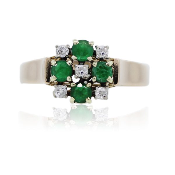 You are viewing this 14k Yellow Gold Diamond and Emerald Ring!