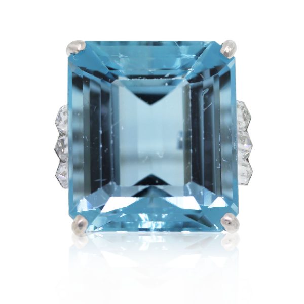 This Platinum 23.77ct Emerald Cut Aquamarine & Bullet Cut Diamond Ring is gorgeous!
