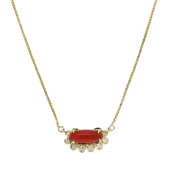 Have you seen this 18kt Yellow Gold Cabochon Coral and Diamond Necklace?