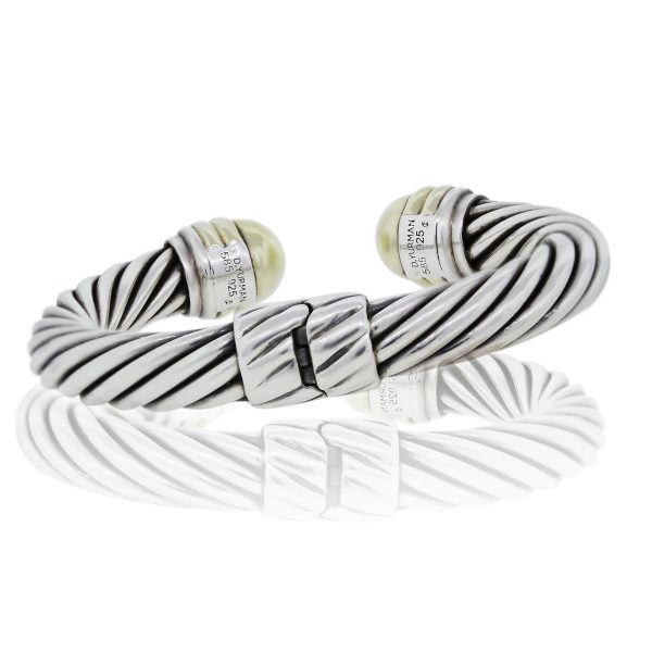 You are viewing this David Yurman Sterling Silver & 14k Yellow Gold Cable Bangle!
