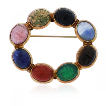 This Gold Plated Multi Colored Semi-Precious Carved Gemstone Pin is so pretty
