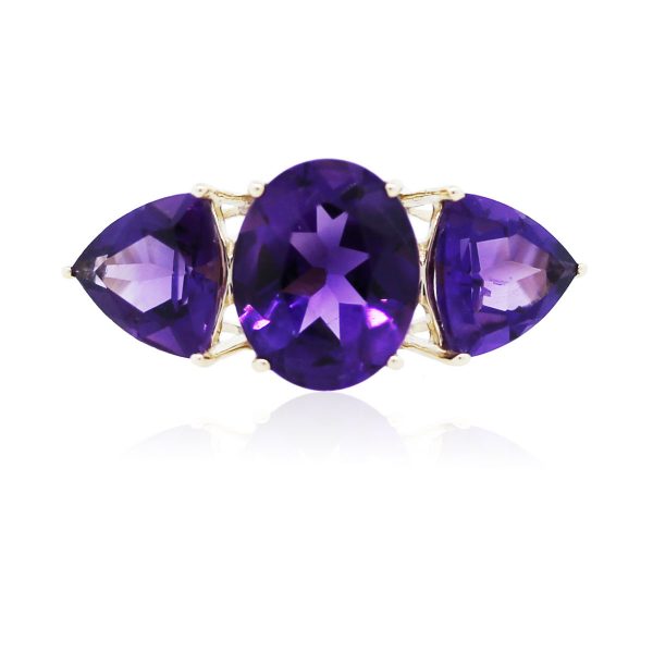 You are viewing this Yellow Gold Trillion and Oval Amethyst Three Stone Ring!